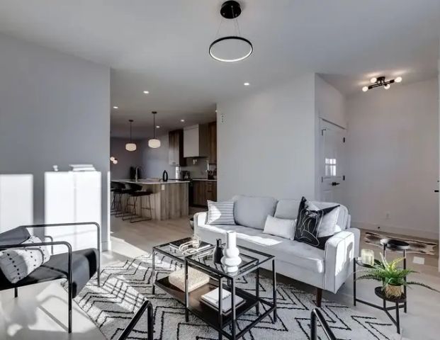 A new and modern three bedroom three bathroom duplex apartment. | 1906 37 Street Southwest, Calgary - Photo 1