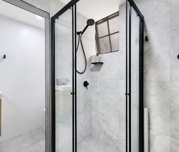 Freshly Renovated Townhouse in Prime Walk-to-Everything Location - Photo 6