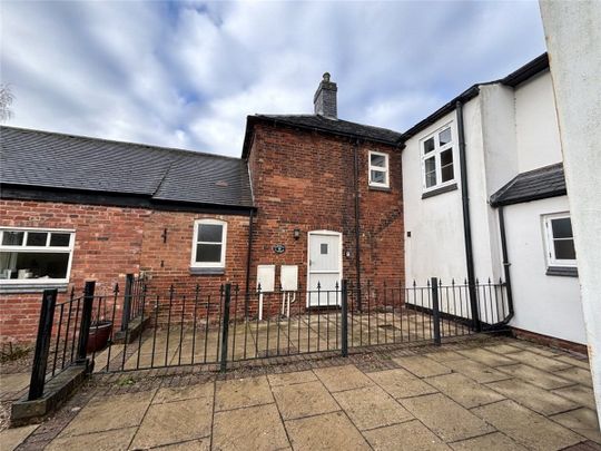 A 2 bedroom terraced cottage with a double garage and off-street parking in Willesley. - Photo 1