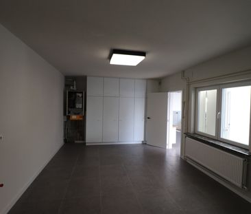 Een gerenoveerde woning met 3 slaapkamers en tuin. - Foto 5