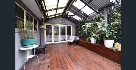 Stunning Two-Level Family Home in Prime Airport West Location - Photo 4