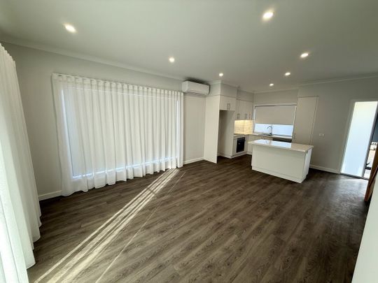 BRAND NEW 2 BEDROOM TOWNHOUSE - Photo 1