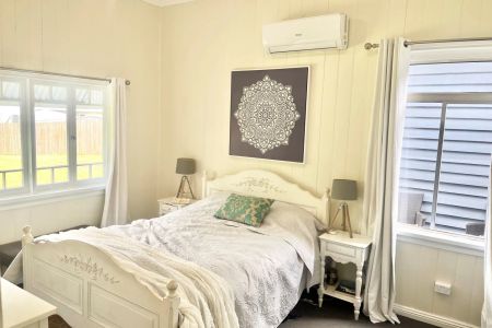 Charming Queenslander with Modern Upgrades and Ultimate Entertaining Space in Prime Location - Photo 4