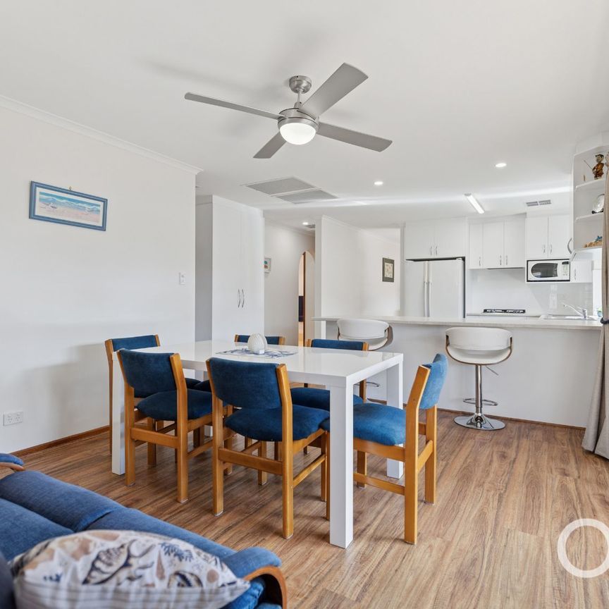 Open the Door to Easy-Care Living with Modern Comfort - Photo 1