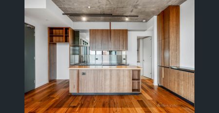 Contemporary Three-Bedroom with Entertainer’s Balcony and Stunning Outlooks - Photo 4