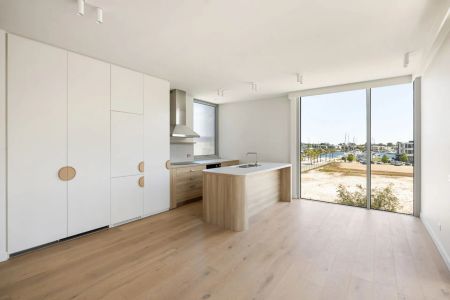 Waterfront Living at Its Finest – Stylish 1st Level Apartment - Photo 4