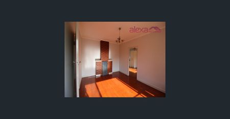 Convenient and Low-Maintenance Living: A Charming 3-Bedroom Brick Home - Photo 2