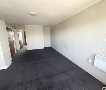 Step into comfort and convenience with this upstairs unit, freshly ... - Photo 4