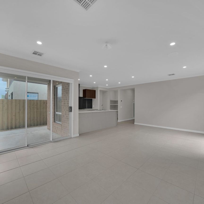 Brand New Henley Home | Spacious Family Living in Prime Wollert Location - Photo 1