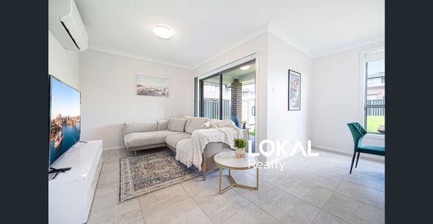 Stylish Near-New Family Home in Prime Leppington Location - Photo 1