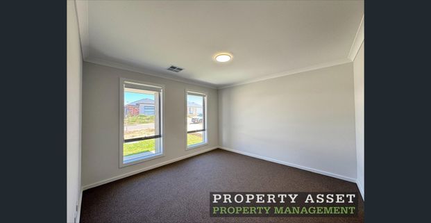 Beautiful Brand-New Family Home with Solar & Second Living Area - Photo 1