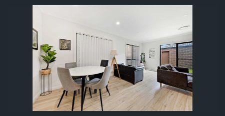 Spacious Modern 4-Bedroom Home in Premier Location | Steps to Park, Shops & Station - Photo 2