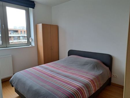 Appartement met 2 slaapkamers, terras en autostaanplaats op gezellige locatie - Photo 2