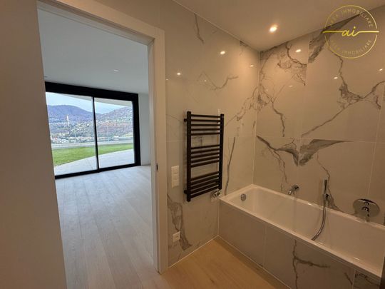 APPARTAMENTO 4.5 LOCALI CON VISTA LAGO - Foto 1