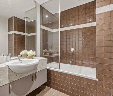 Secluded & Spacious Townhouse is in Heart Of The Action - Photo 5