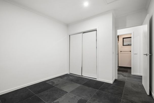 Modern Two-Bedroom Townhouse in a Prime Location - Photo 1