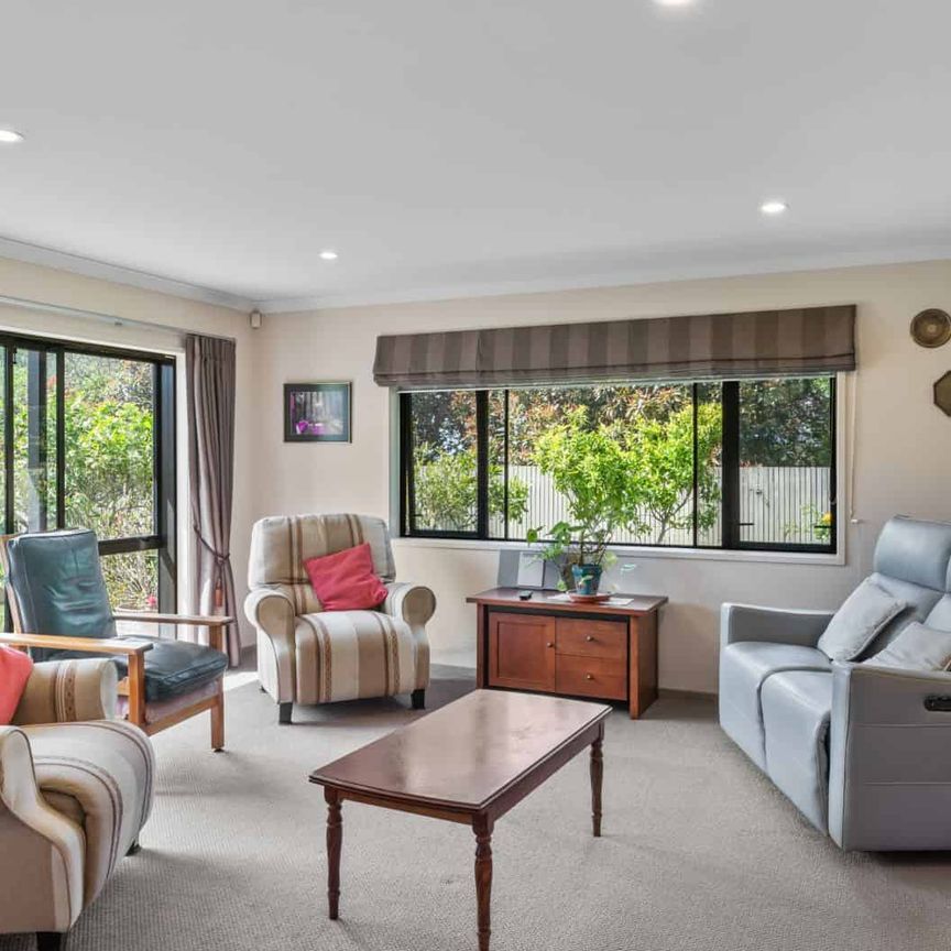 Spacious Four-Bedroom Home with Multiple Living Areas and Private Garden Retreat - Photo 1