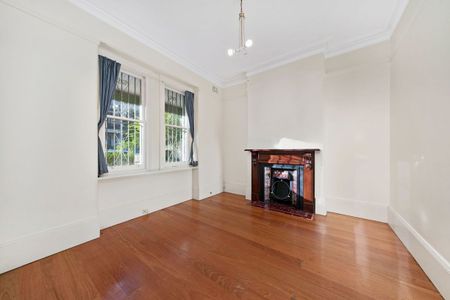Centrally Located Three Bedroom Home | 6 month lease - Photo 3