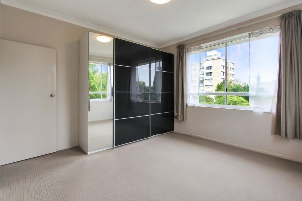 OVERSIZED ONE BEDROOM UNIT WITH LEAFY OUTLOOK - Photo 1