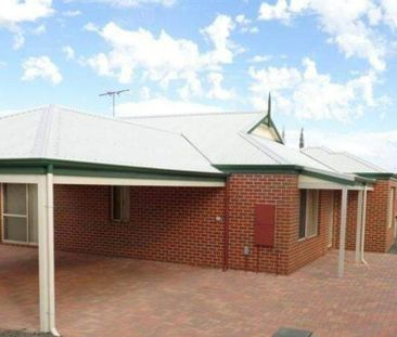 NEAT & COMFORTABLE HOME IN CONVENIENT LOCATION - Photo 1