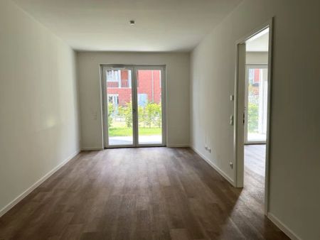 Familienfreundliche Erdgeschosswohnung mit Terrasse und kleinen Garten - Foto 3