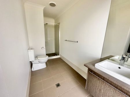 Modern Four Bedroom Home in a Desirable Location! - Photo 2