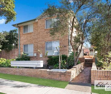 Two-Bedroom Brick Townhouse with Private Courtyard - Photo 5