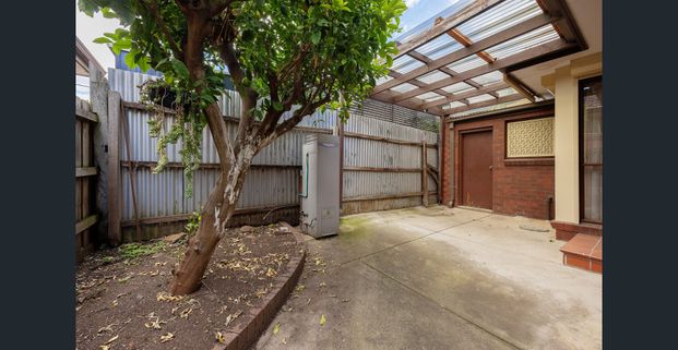 Spacious well located home! - Photo 1