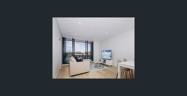 Immaculate Near-New One Bedroom Residence | Premium Finishes & Prime Location - Photo 1