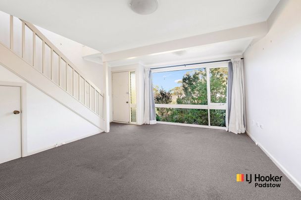 Spacious Two-Bedroom Townhouse in Peaceful, Convenient Location - Photo 1