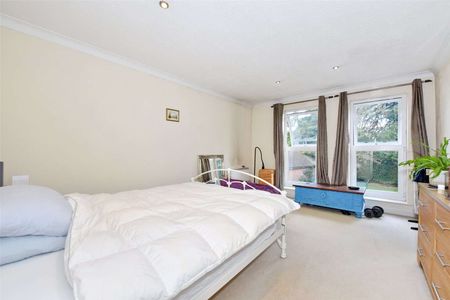 A spacious two bedroom apartment with off-street parking and garage in a peaceful setting. - Photo 3