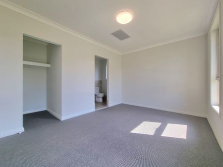 BRAND NEW Family Home with Flexible Floor Plan - Photo 4