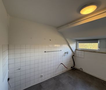 Wohnen mit Blick auf das Bismarckviertel – charmante 3-Zimmer-Dachg... - Photo 4