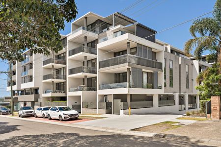 Bright and tranquil living in the modern 'Palais' community - Photo 3