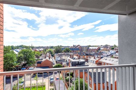 A modern one bedroom apartment on an upper floor in this town centre development, benefiting from a balcony and parking space. - Photo 4