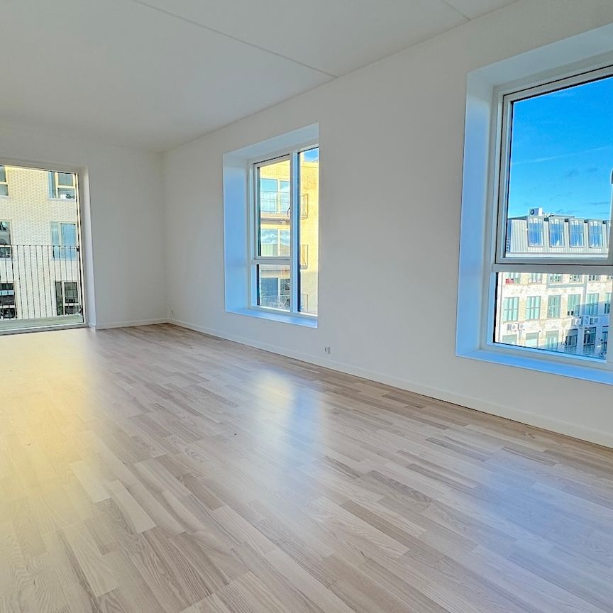 Nyere lys lejlighed i populært område - Photo 2