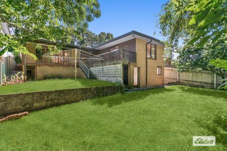 Spacious 4-Bedroom Home in Prime West Wollongong Location - Photo 4