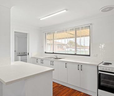 Spacious 3-Bedroom Home with Large Yard & New Kitchen - Photo 5