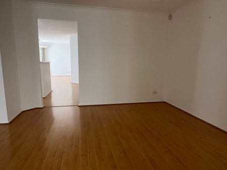 FOUR BEDROOM, TWO LIVING FAMILY HOME IN GREAT LOCATION - Photo 3