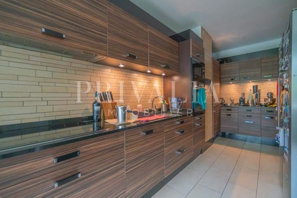 Magnifique appartement traversant dans un environnement verdoyant au cœur de Florissant - Photo 1