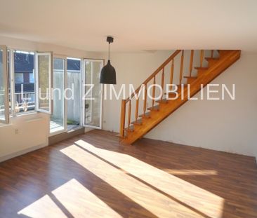 ** Maisonettewohnung mit Balkon** für Singles in gepflegtem Umfeld ! - Foto 1