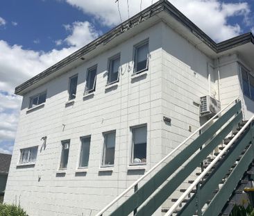 Step into comfort and convenience with this upstairs unit, freshly ... - Photo 2