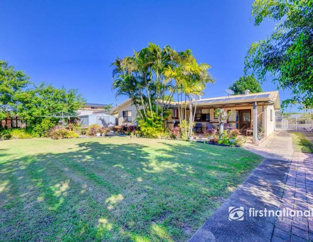 IMMACULATE BRICK HOME WITH SOLAR IN AVENELL HEIGHTS - Photo 1