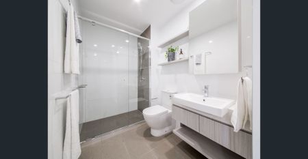 Beautiful Apartment with Sunny North-East-facing Balcony in the Heart of Spring Hill! - Photo 4