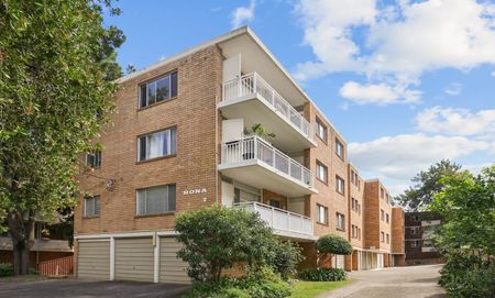 Newly Renovated Two-Bedroom Apartment in Prime Location - Photo 2