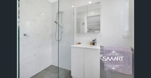 Immaculate Duplex , Close to the Broadwater! - Photo 1