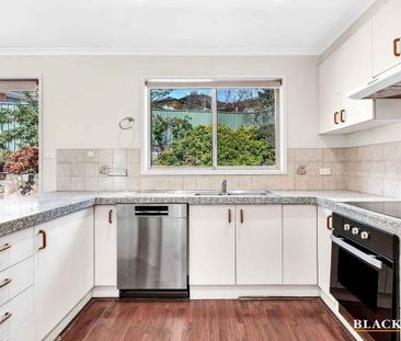 Elevated home in a convenient location - Photo 2