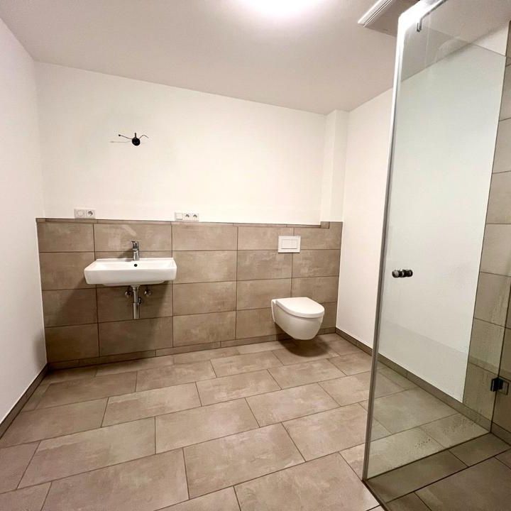 Modernes Wohnen in Voxtrup: Stilvolle 2-Zimmer-Erdgeschosswohnung mit Terrasse - Photo 1