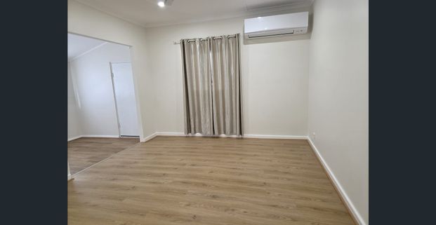 Renovated 2-Bedroom Home – Border of Beachlands Primary, Very Close to the Ocean - Photo 1