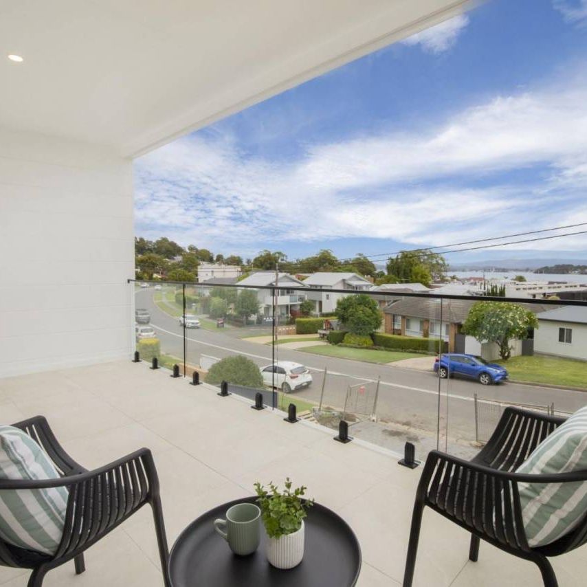 Luxurious New 4-Bedroom Townhouse with Water Views, Private Lift & Premium Features - Photo 1